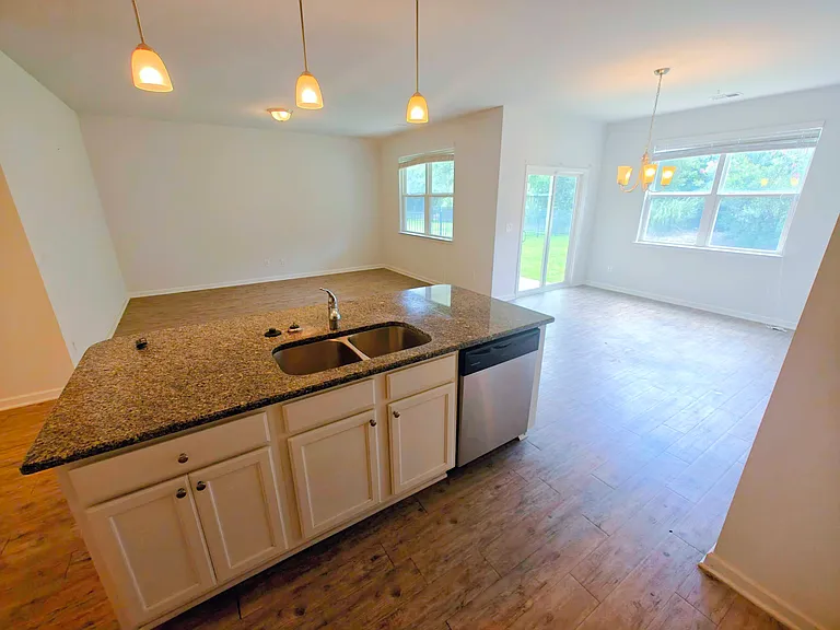 Kitchen, dining, and living room