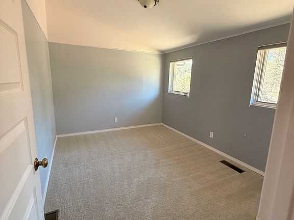 Upstairs bedroom with walk in cloest