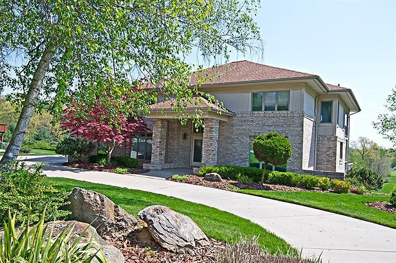 A governor drive welcomes you to 109 Golfview Dr. Beautiful landscaping and a huge covered front porch as well.