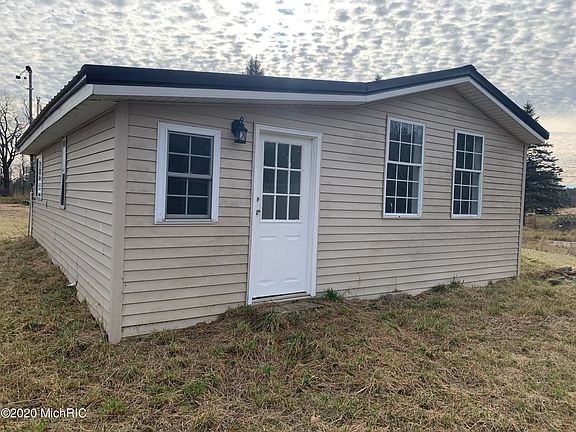 homes for sale on half moon lake pinckney mi