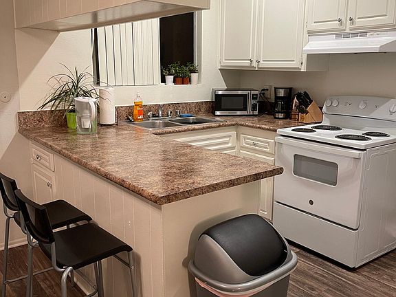 Full kitchen all essentials here, including plates, cookware and silverware