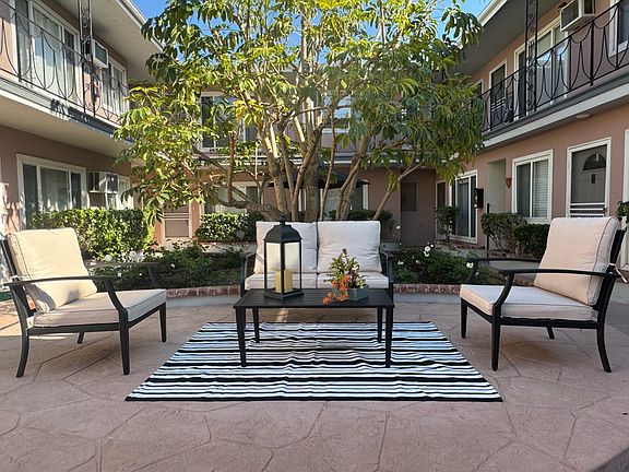 One of three outdoor seating and dining areas.