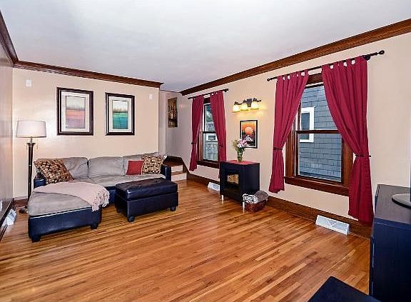 The main floor living room with beautiful, true hardwood floors.