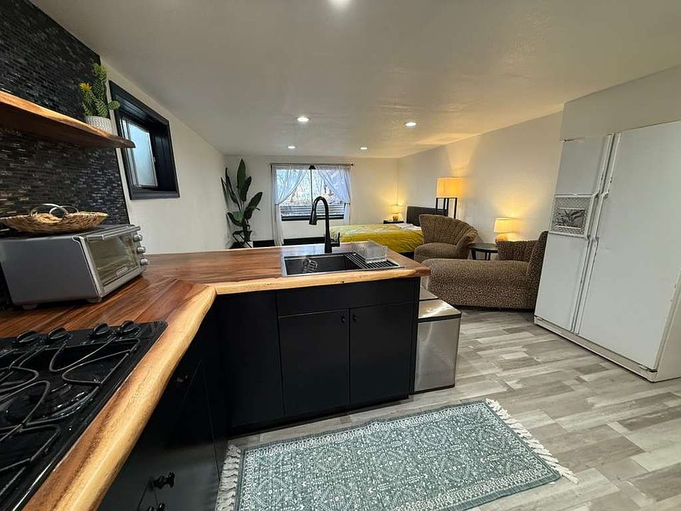 Newly renovated kitchen with gas stove.