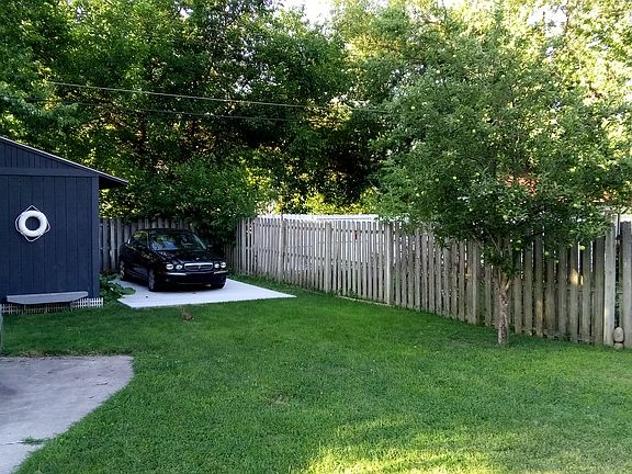backyard & new parking pad.