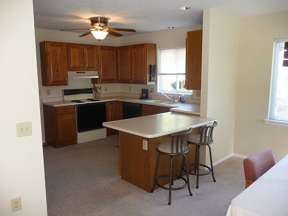 Oak cabinets enhance this generous 10.5'x13.5' Kitchen. Recessed lights 