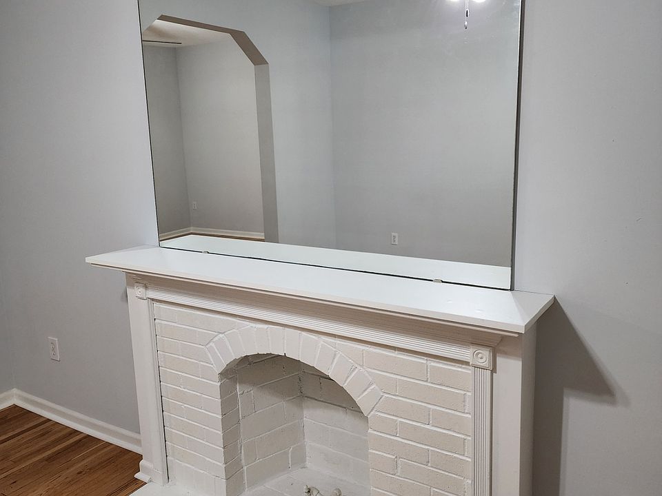 Decorative Fireplace and Mirror in the front room