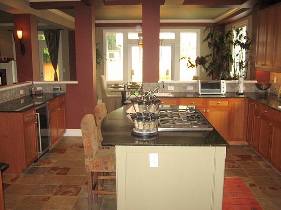 Kitchen with Cherry Cabinets and Floors