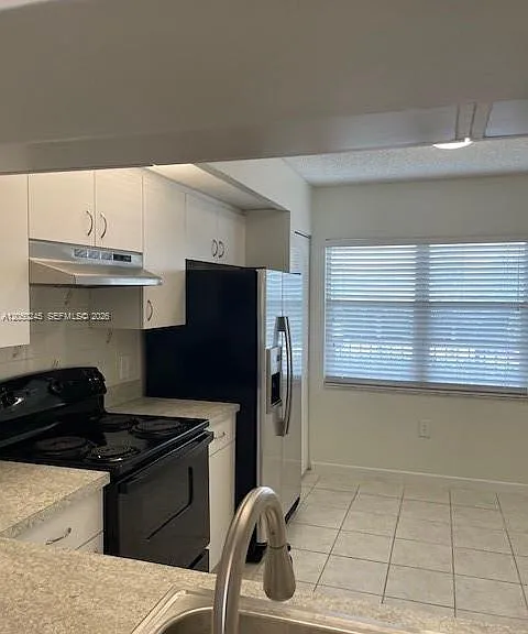 12955 SW 16th Ct #312M — Photo 10