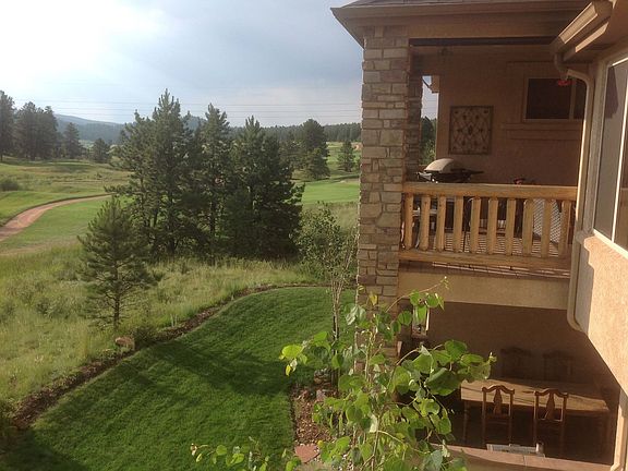Deck and Patio overlook the 8th Fairway