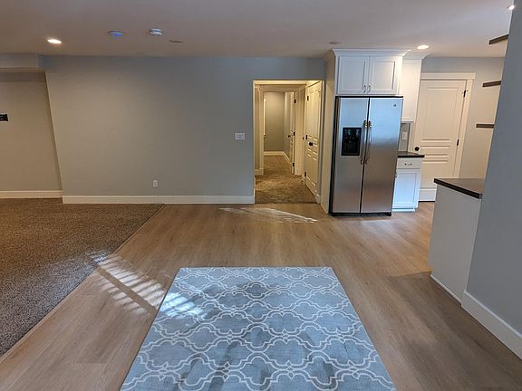 The photo is taken from the windows of the large dining room. Very spacious and bright! Brand new flooring in Kitchen, Dining and Bathroom areas.