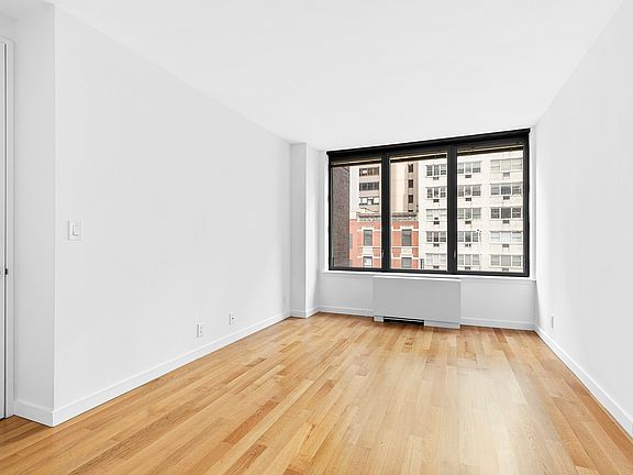 4th image of 150 E 57th St APT 28D