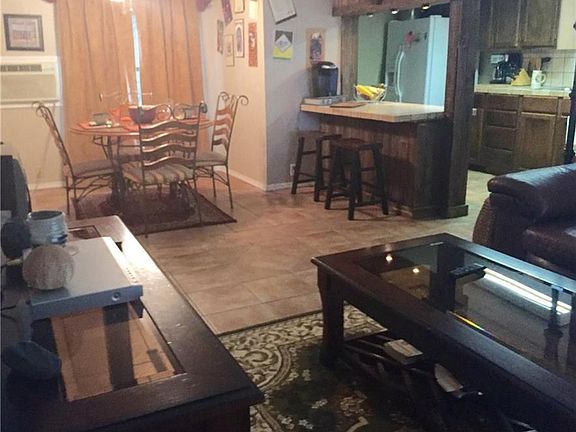 Adorable living, dining, and kitchen area.