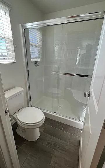 Master shower and toilet