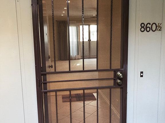 FRONT ENTRANCE WITH SECURITY SCREEN DOOR