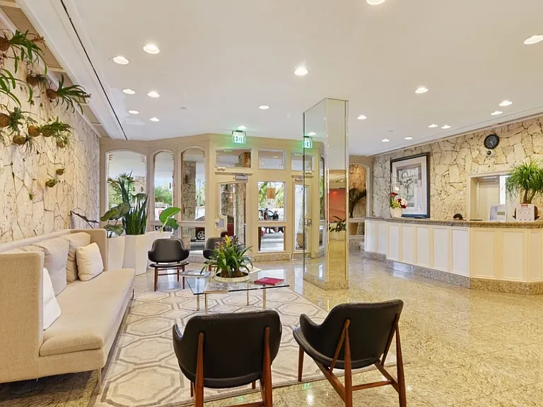 Luxury building's RECEPTION area with 24hr full-service front desk, mailroom & valet (included FREE for tenants)