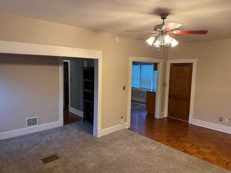 Living room looking toward the kitchen and entryway