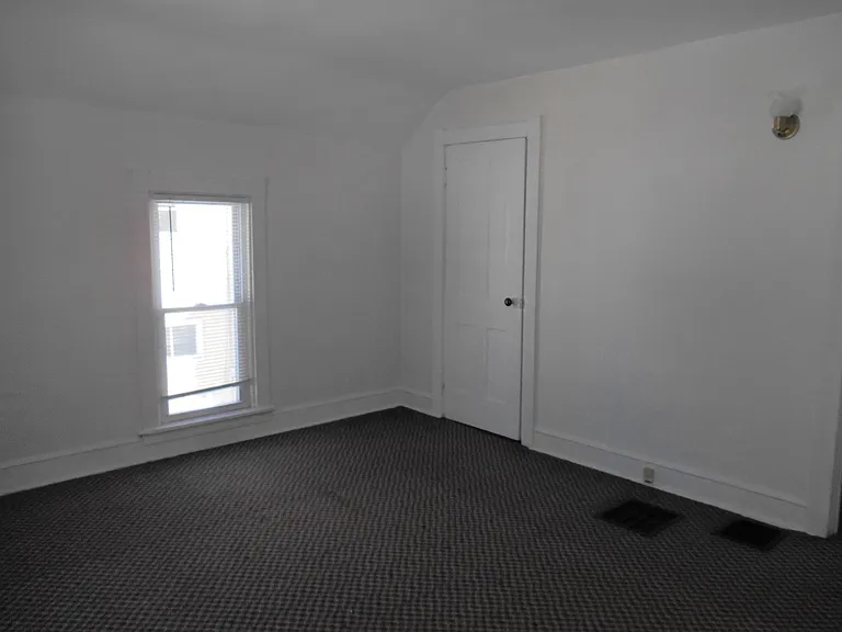 master room with walk in closet
