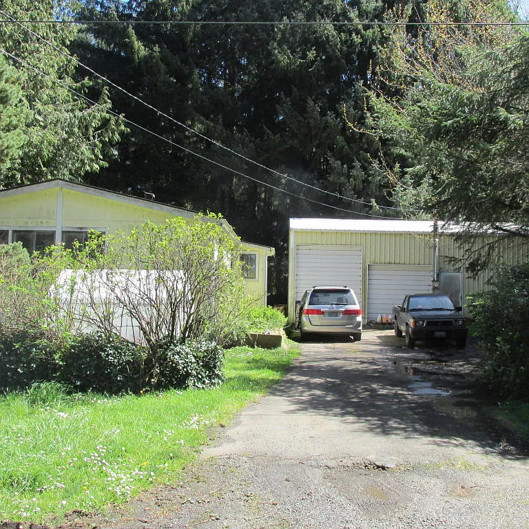 3240 NE Hideaway Ln photo 1