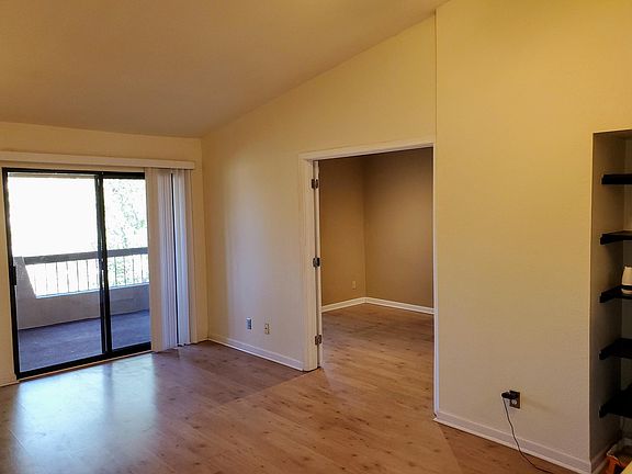 Living Area with Double Door Entrance to 2nd Bedroom