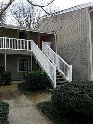 Condo unit is up the stairs and to the left