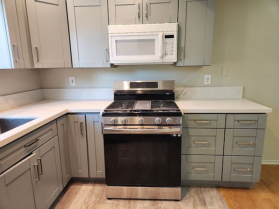 Gas range and microwave