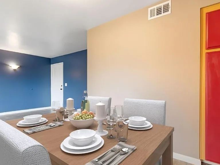 Dining room and living room/entry. Paint has been updated to neutral colors.