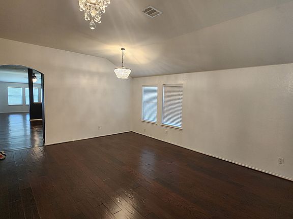 Living Room Left Angle standing in front door.