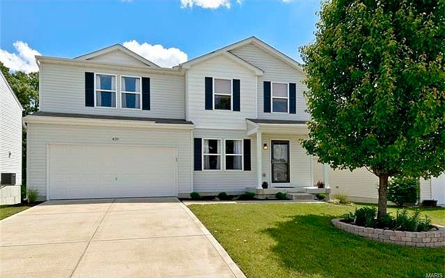 Charming 2 story, 3 bed, 2.5 bath with brand new landscaping that gives it great curb appeal