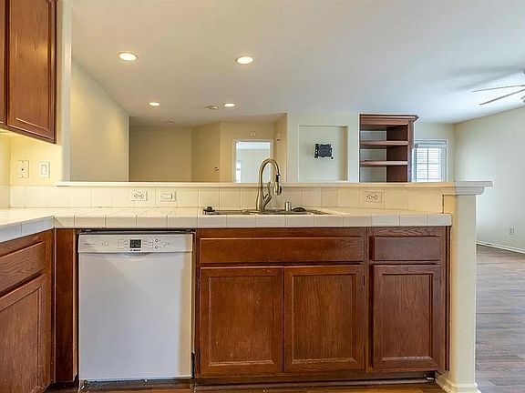 Kitchen complete with appliances.