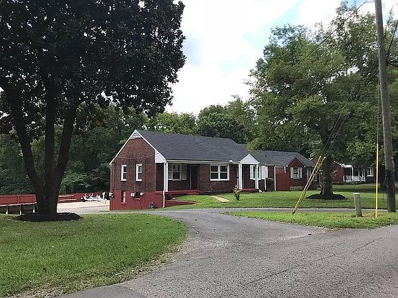 View from the side of duplex with driveway