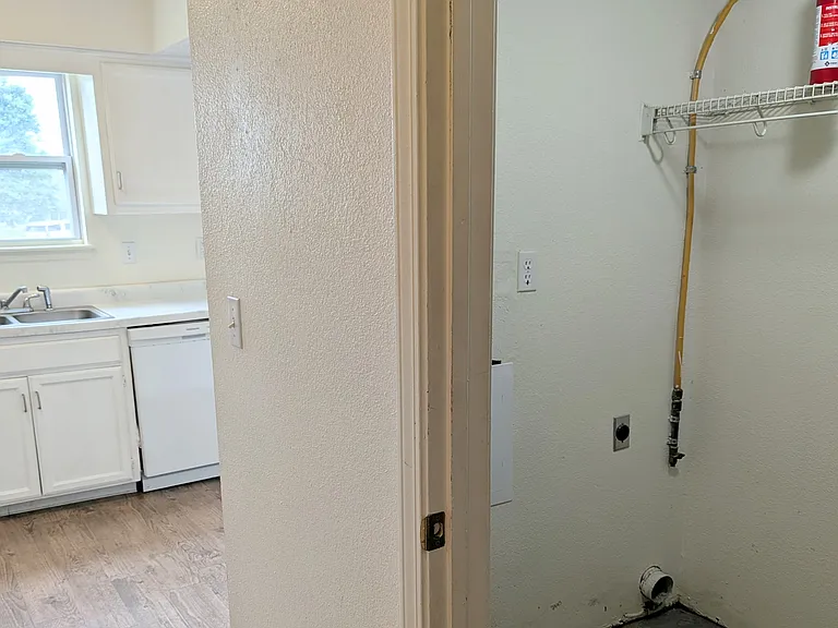 Laundry room with laundry hookups