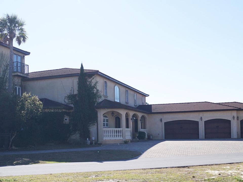 3 car + golf cart garages