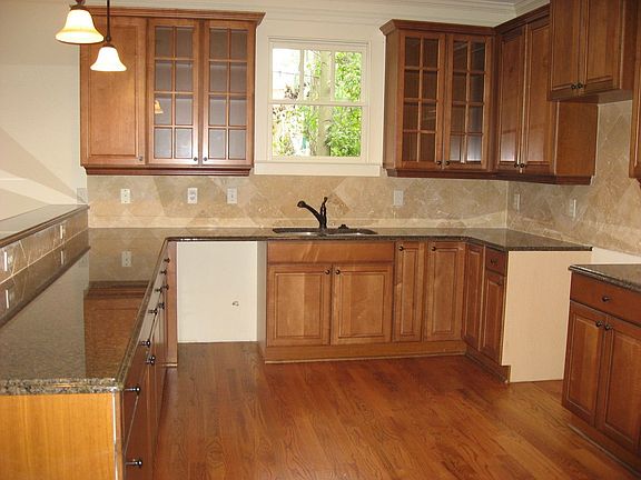 Large open kitchen with beautiful cabinetry and granite countertops