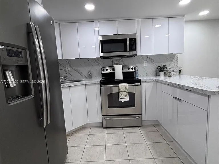 5575 W 26th Ct #206 — Photo 2