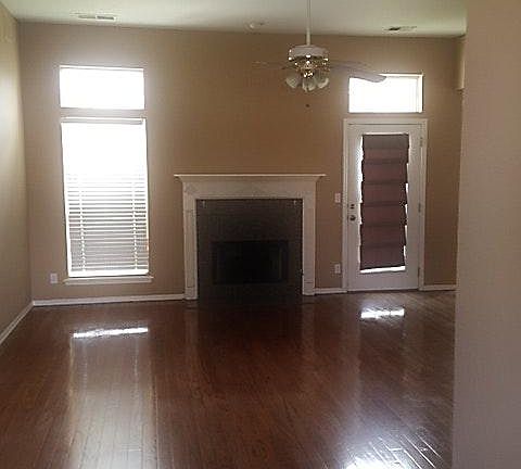 Fireplace and hardwood floor