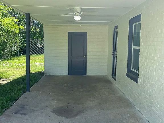 Covered parking that leads to utility room