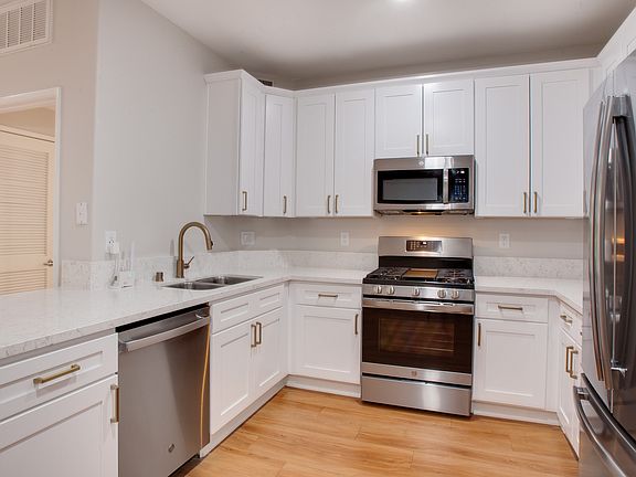Large kitchens with ample cabinet and countertop space