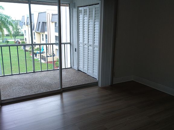 balcony with closeted in unit laundry