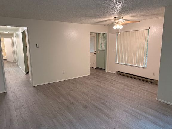 Newer wood laminate flooring throughout main level living areas. 
All new interior paint.