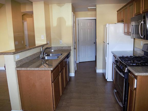 Kitchen with Granite Counters and Stainless Steel Appliances