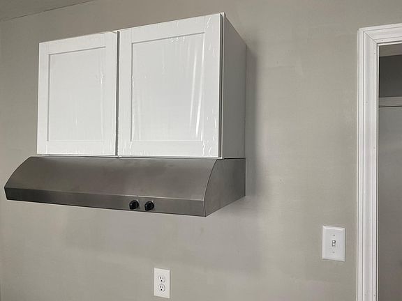 Over range vent hood with light.