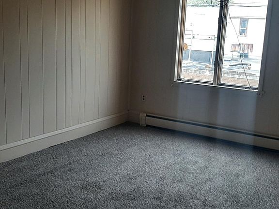 Large living room. New carpeting.