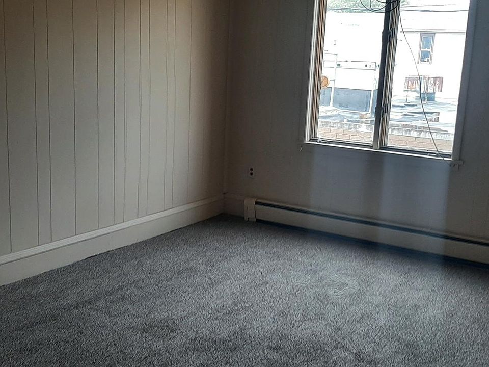 Large living room. New carpeting.