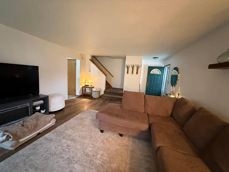 living room area with front closet