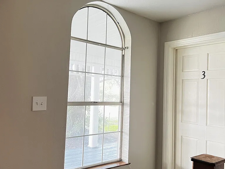 Large windows that let in natural light throughout the home.