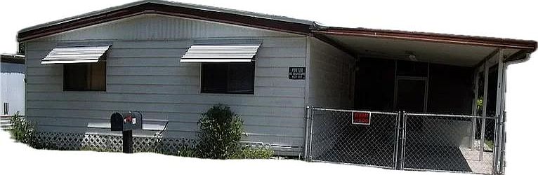 Front exterior with carport