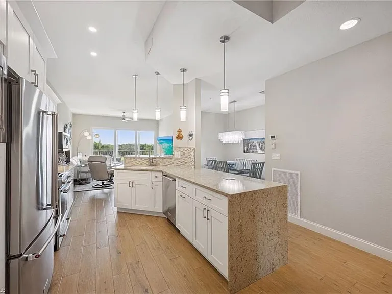 7687 Pebble Creek Cir #403 — Photo 9