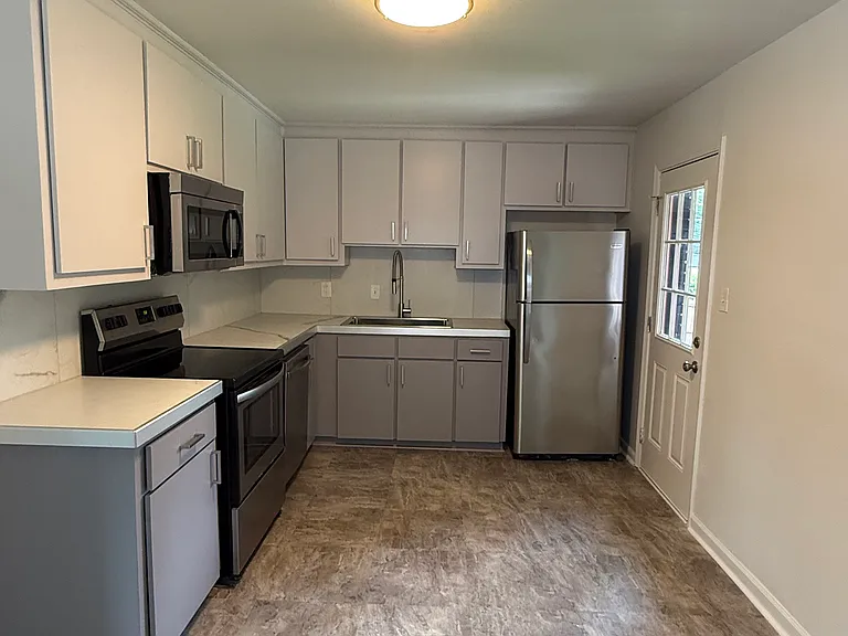 Kitchen with entry to the backyard