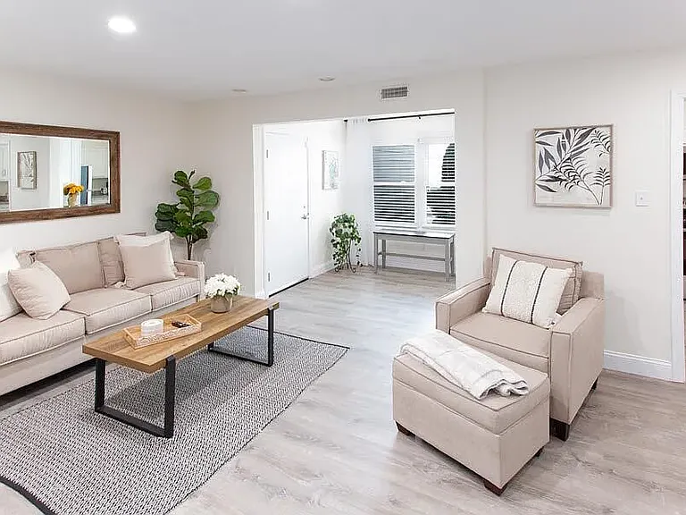 MODEL LIVING ROOM/SUNROOM AREA